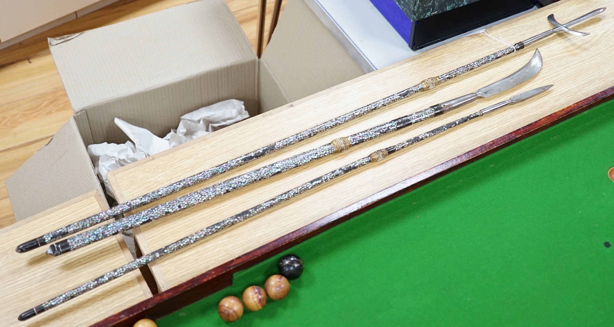 A set of three Japanese Nanban lacquer handled Samurai polearm weapons, Edo period, the largest 100cm in length